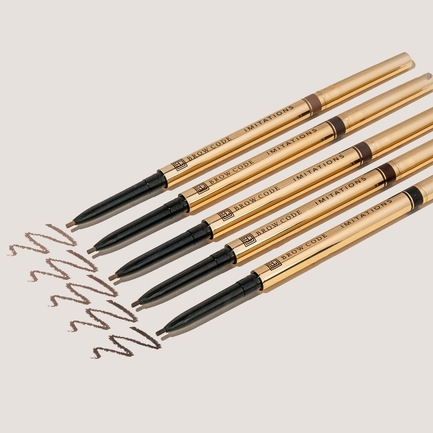 Group shot of all pencils with colour swatches