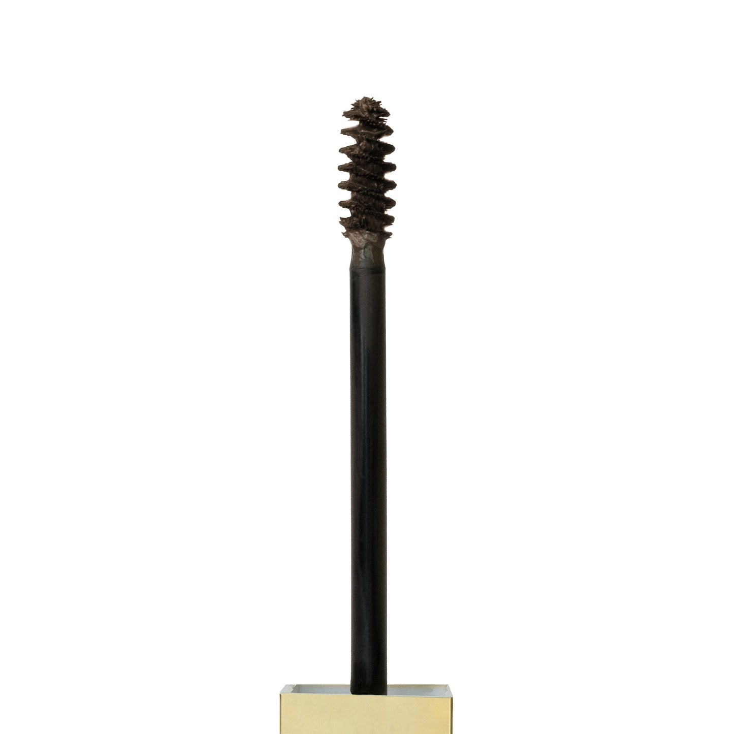 Close up shot of spoolie with Tinted Multi-Peptide Brow Gel - color-taupe