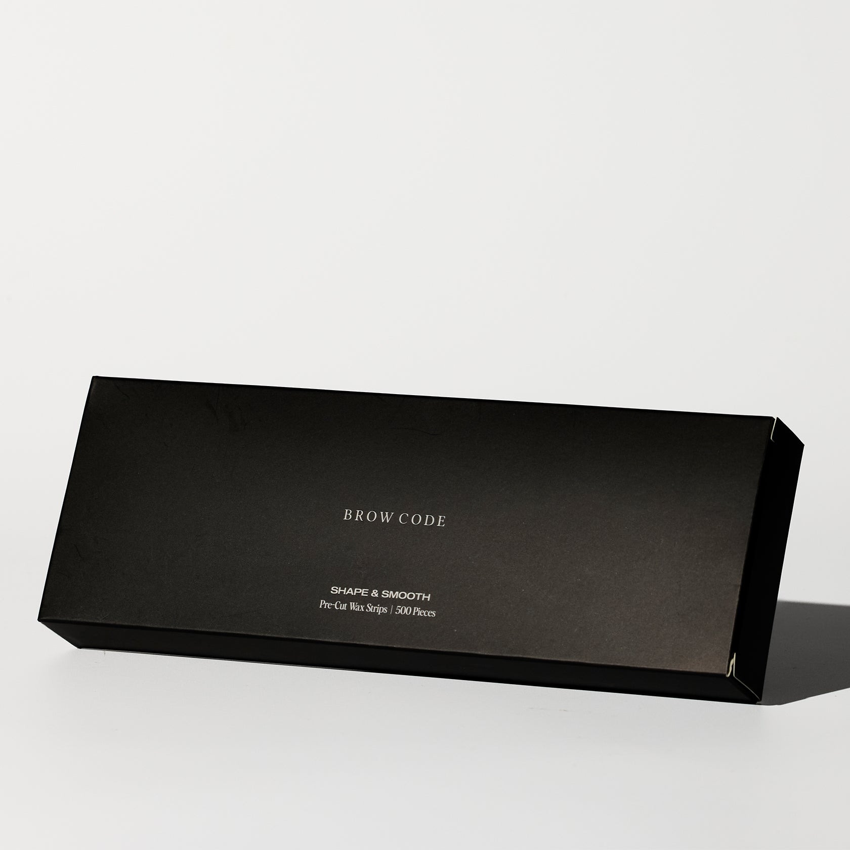 Brow Code's Pre-Cut Wax Strips packaging on a white background