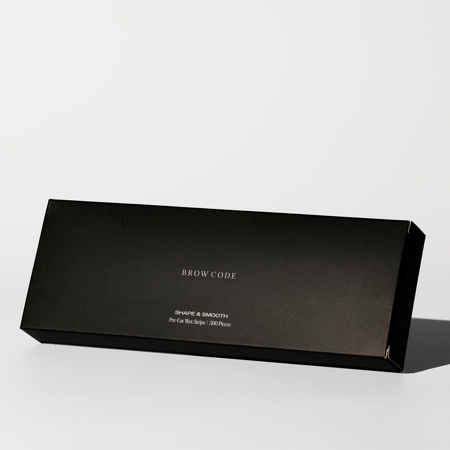 Brow Code's Pre-Cut Wax Strips packaging on a white background